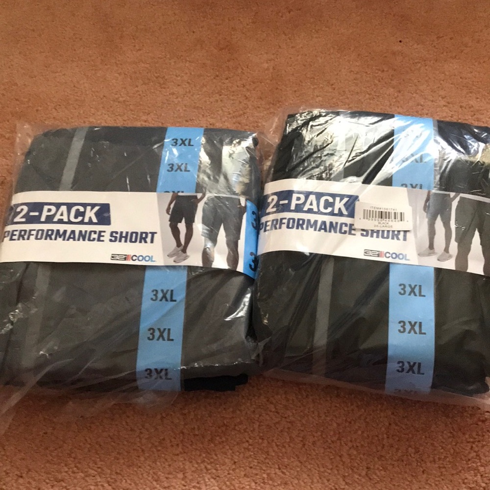 PRICE FIRM (2) packs of (2)pair in each pack  of men’s performance shorts (
